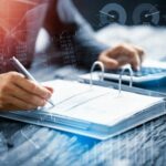 Accountant,Doing,Accounting,And,Tax,And,Financial,Ledger