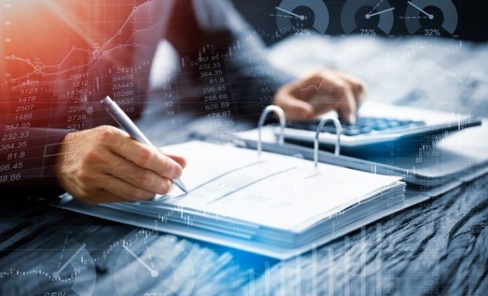 Accountant,Doing,Accounting,And,Tax,And,Financial,Ledger